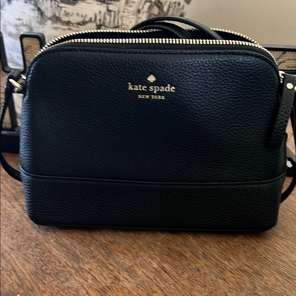 kate spade Handbags - Title:
Kate Spade New York Pebbled Leather Crossbody Bag - Black
